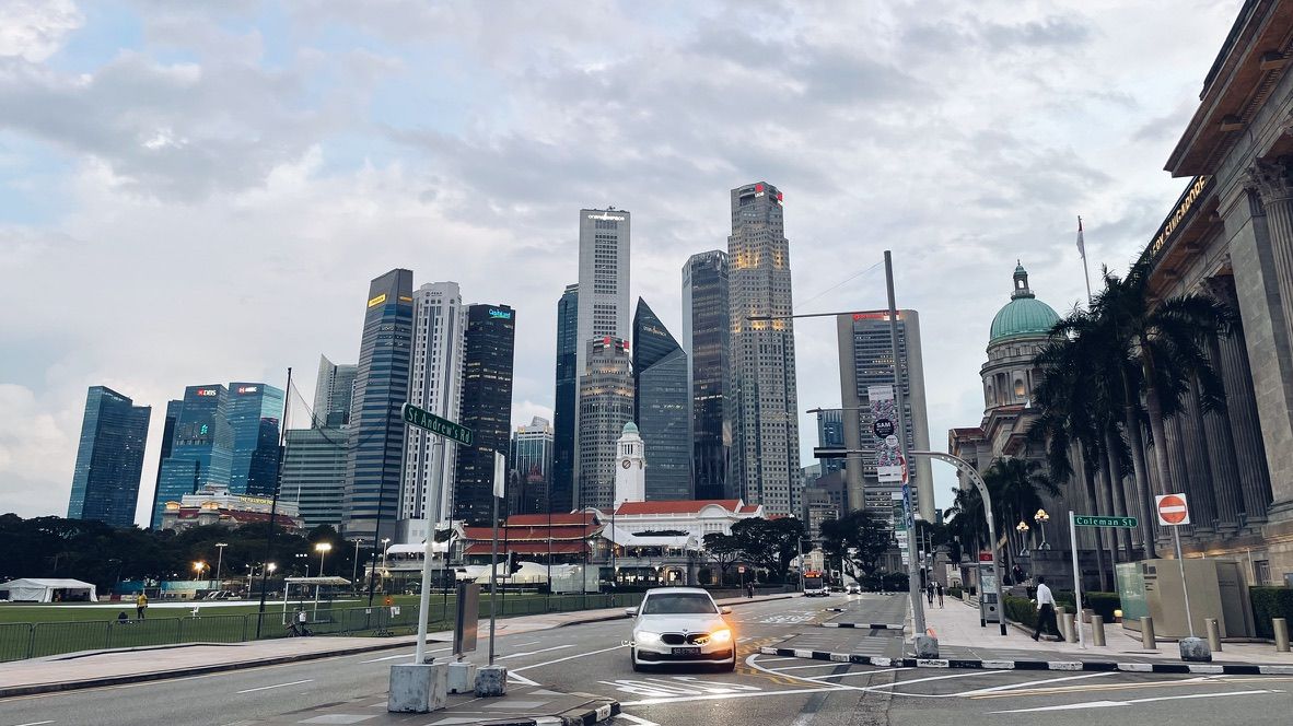 Singapore's civic district, with a skyline of skyscrapers in the background.